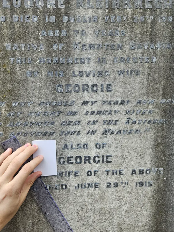 A hand covering part of the reference card and hiding its corners